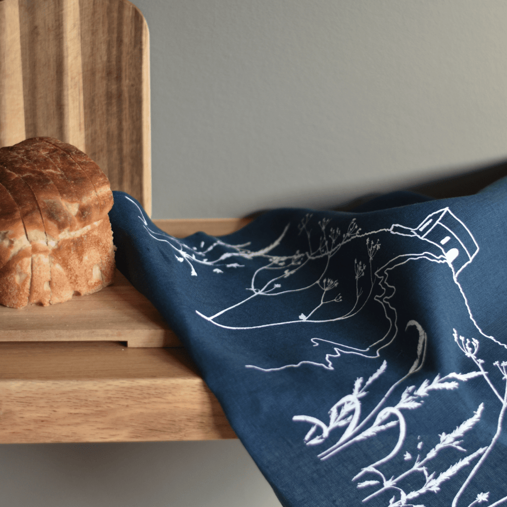 Linen Tea Towel With Rame Head Design