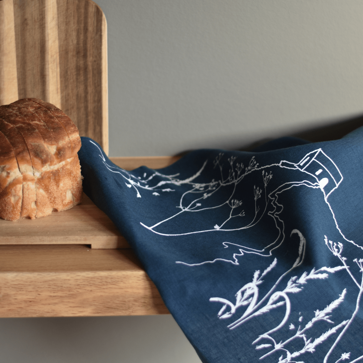 Linen Tea Towel With Rame Head Design